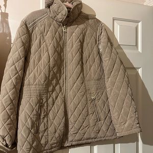 Michael Korr’s winter coat beige